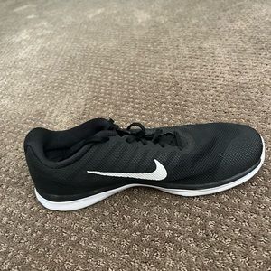 Nike running sneakers, women’s size 9.5. Worn few times on a track.